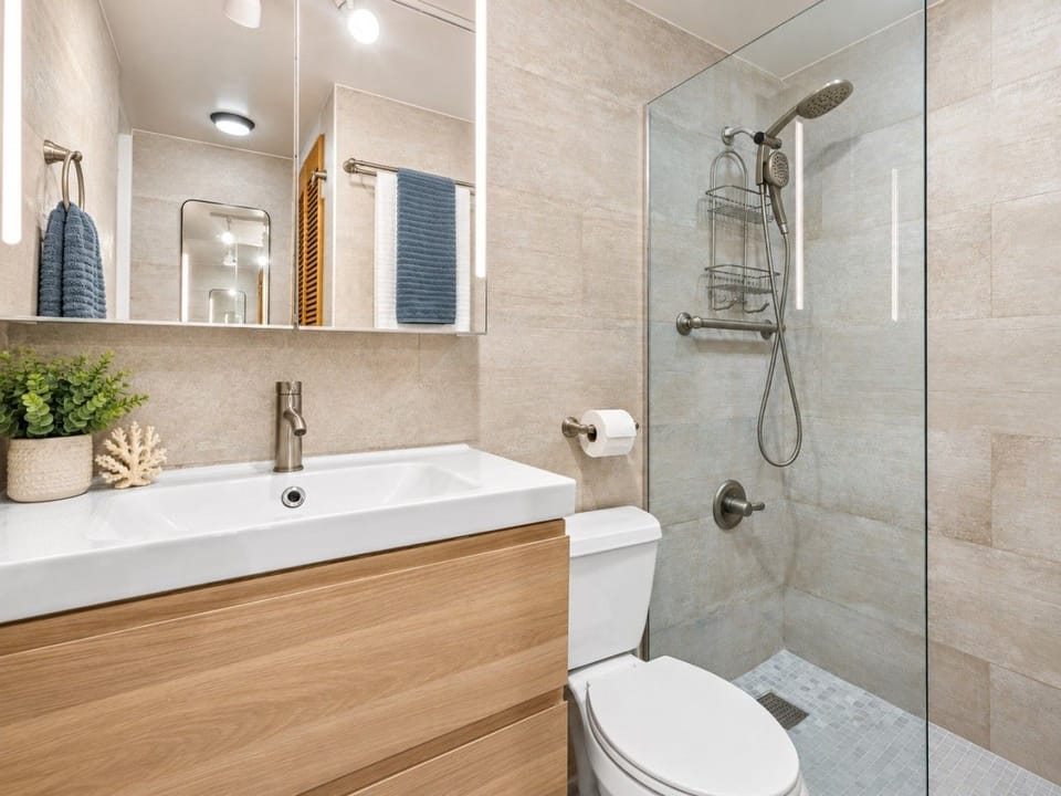 A private, modern bathroom conveniently connected to the primary bedroom.