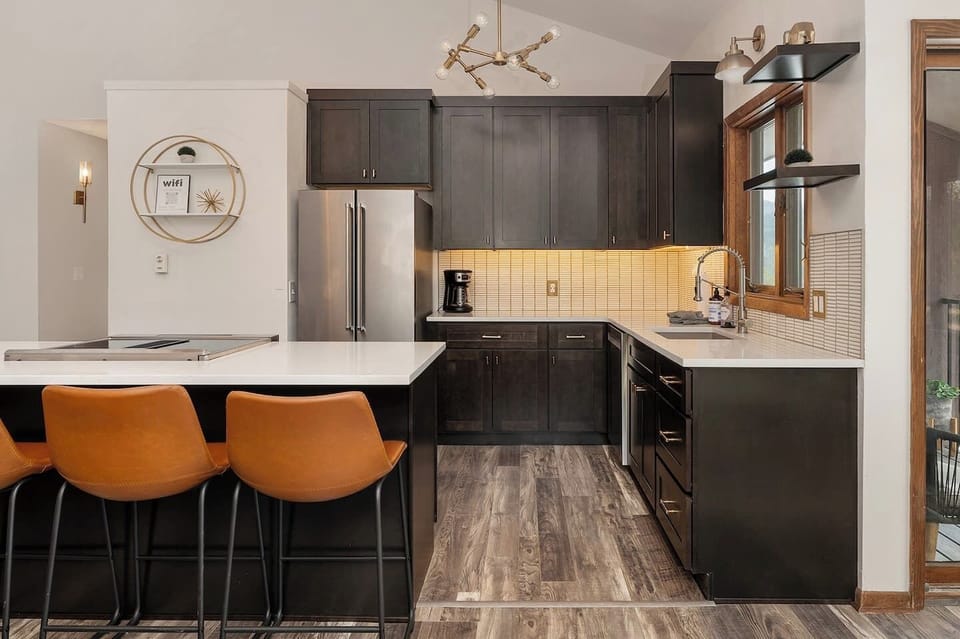 Open kitchen with quartz and new stainless appliances