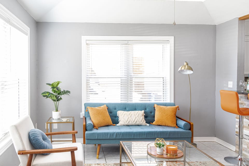 Full size couch & accent chair allows for guests to lounge comfortably together