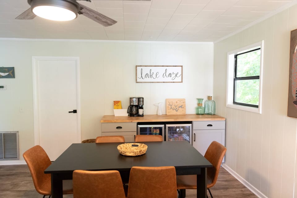 Dining area indoors with large coffee bar, two mini fridges for all your drinks