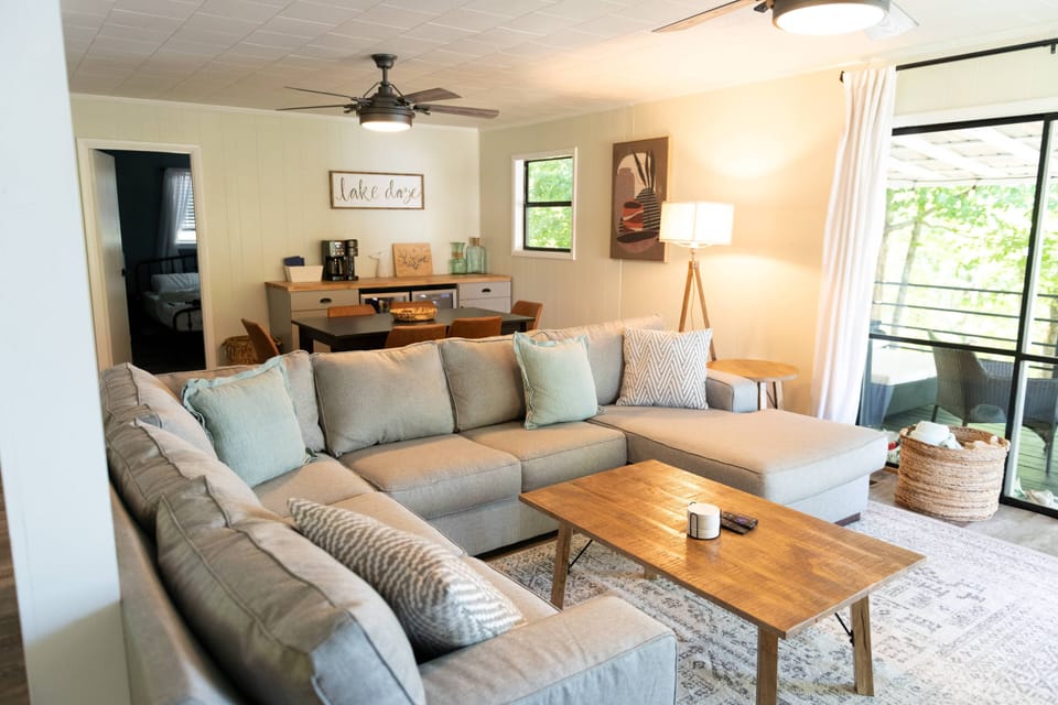 Comfy living room with water view from every seat of the couch!