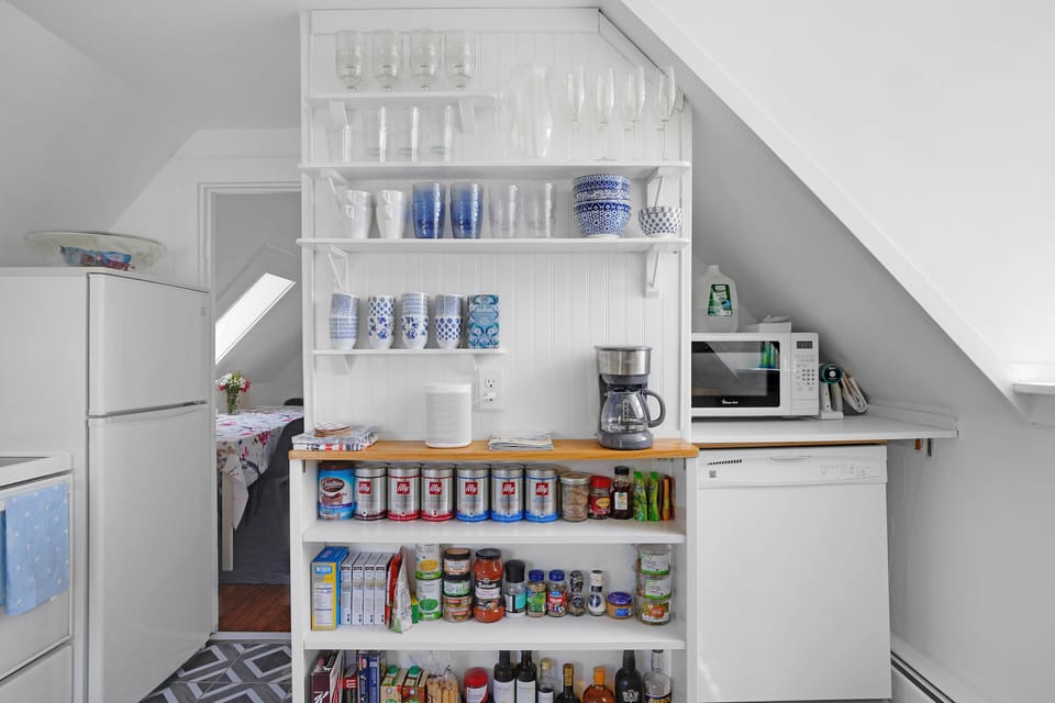 Kitchen and microwave and portable dishwasher