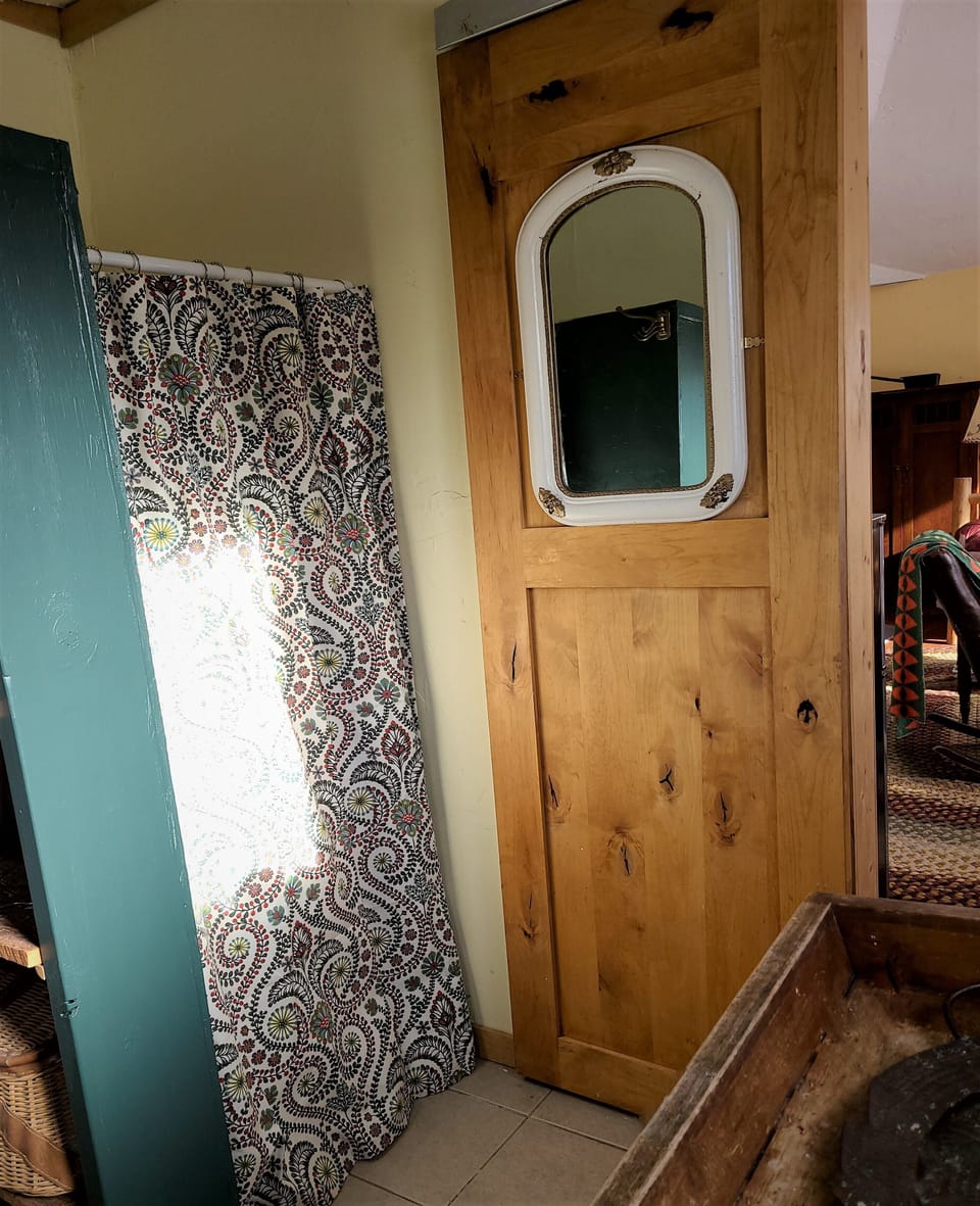 More of the "west wing"  slider door provides privacy between rooms.