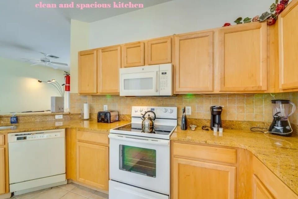 Kitchen with coffee and blender shown