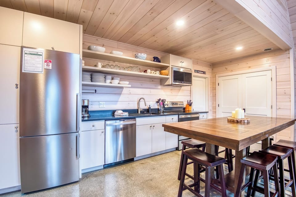 Fully applianced kitchen and dining area