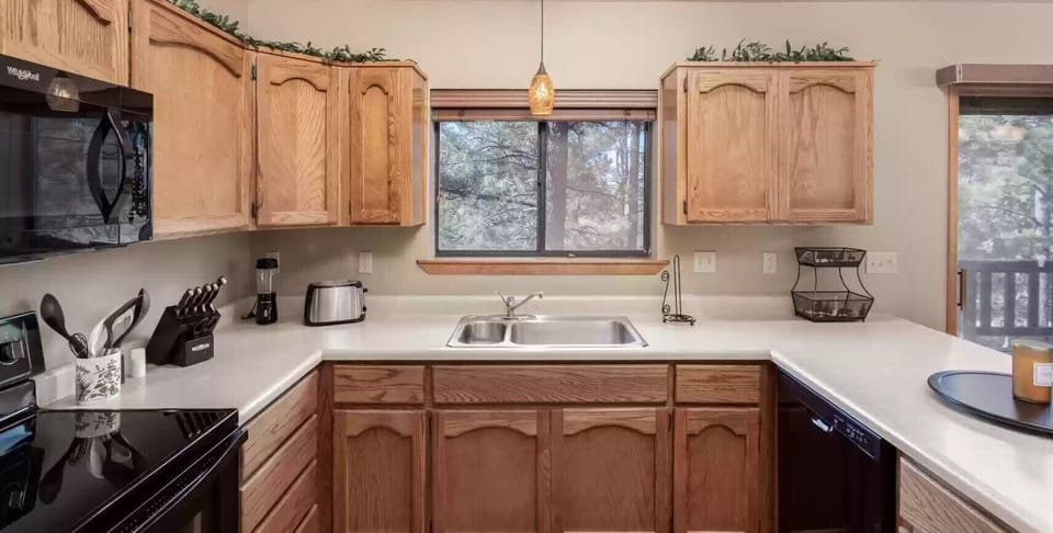 Kitchen is supplied with everything you may need for cooking 