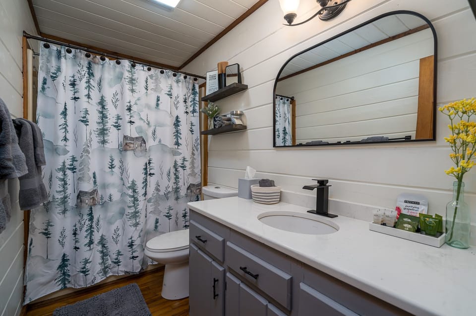 Upper level bathroom stocked with many toiletries and extra towels for your stay