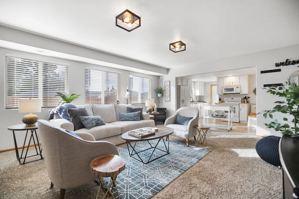 Living Room: Bright retreat with plush seating —perfect for unwinding and fun!