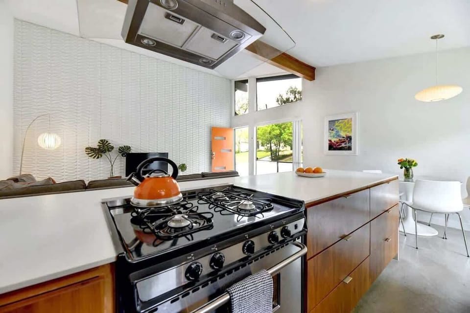 View from the open galley-style kitchen into the living room.