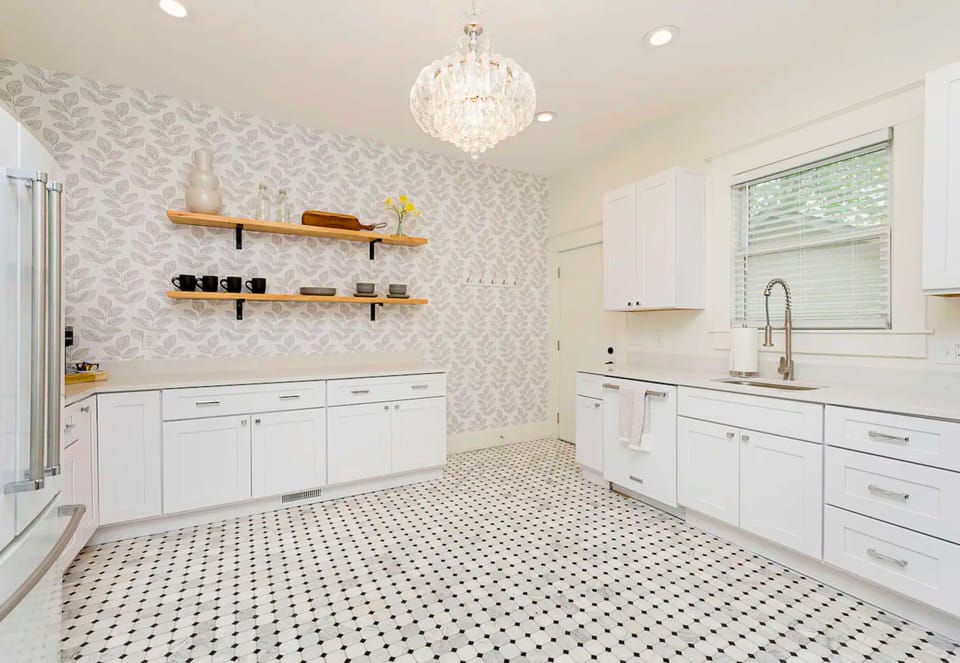 Perfect for Cooking for a Crowd, the Kitchen is Wide Open, Bright and Spacious.