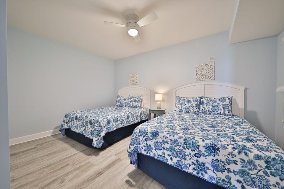 3rd bedroom with 2 queen size beds.