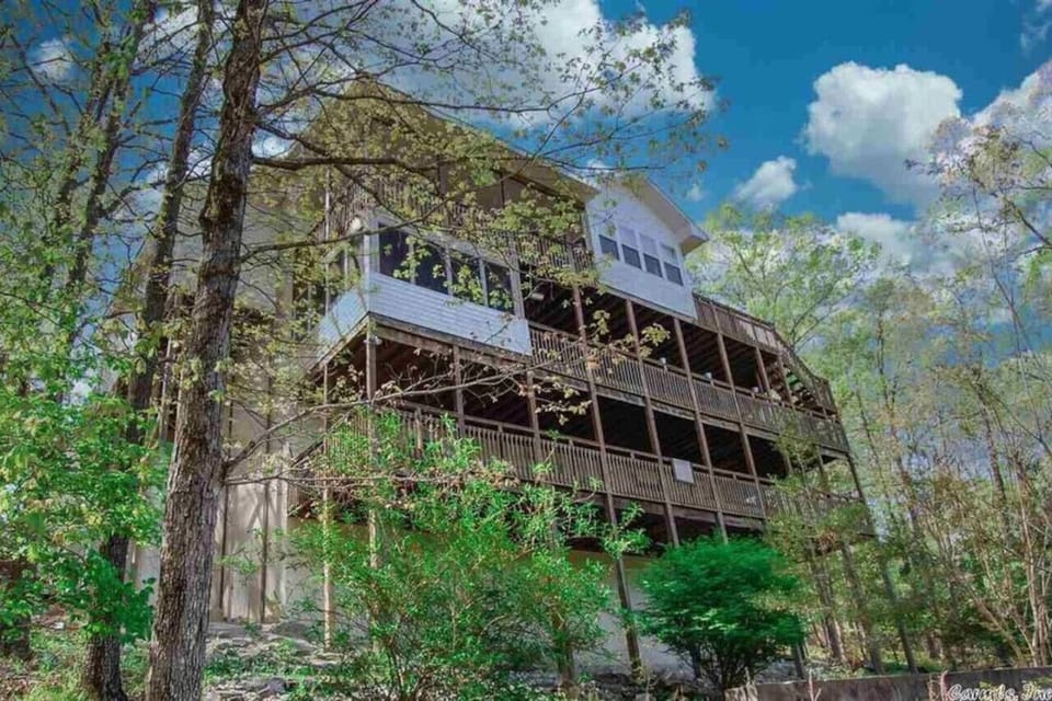 Charming multi-level retreat nestled in the trees, offering peace, privacy, and stunning natural surroundings.