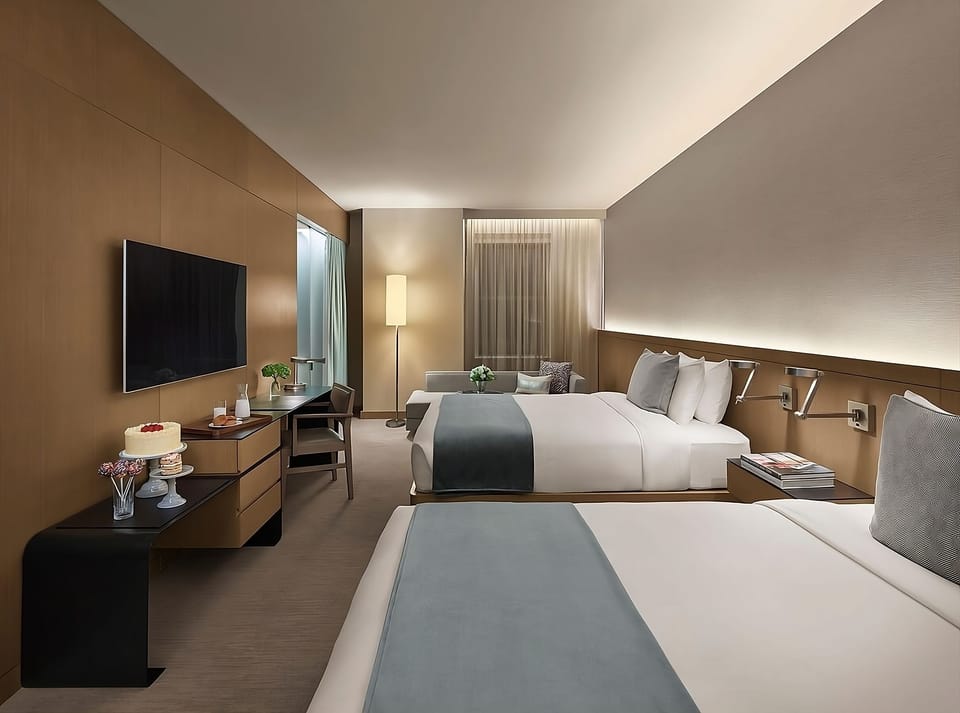 Settle in comfortably with two plush beds and warm lighting.