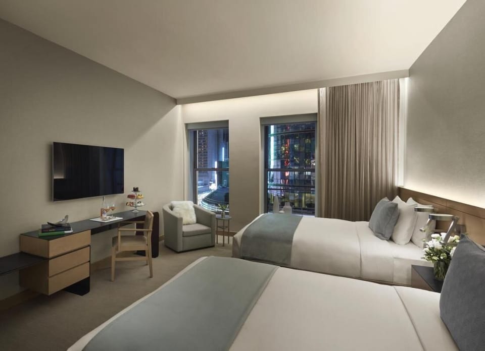 Relax after sightseeing in a quiet room with cozy seating.