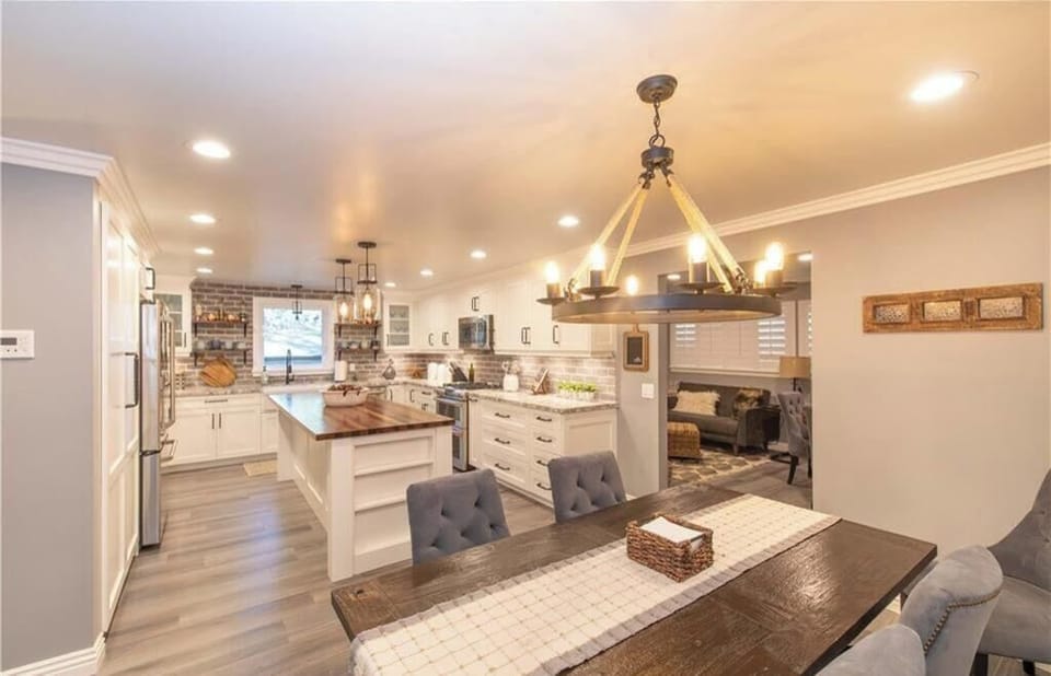 Dining area open to the game room and kitchen