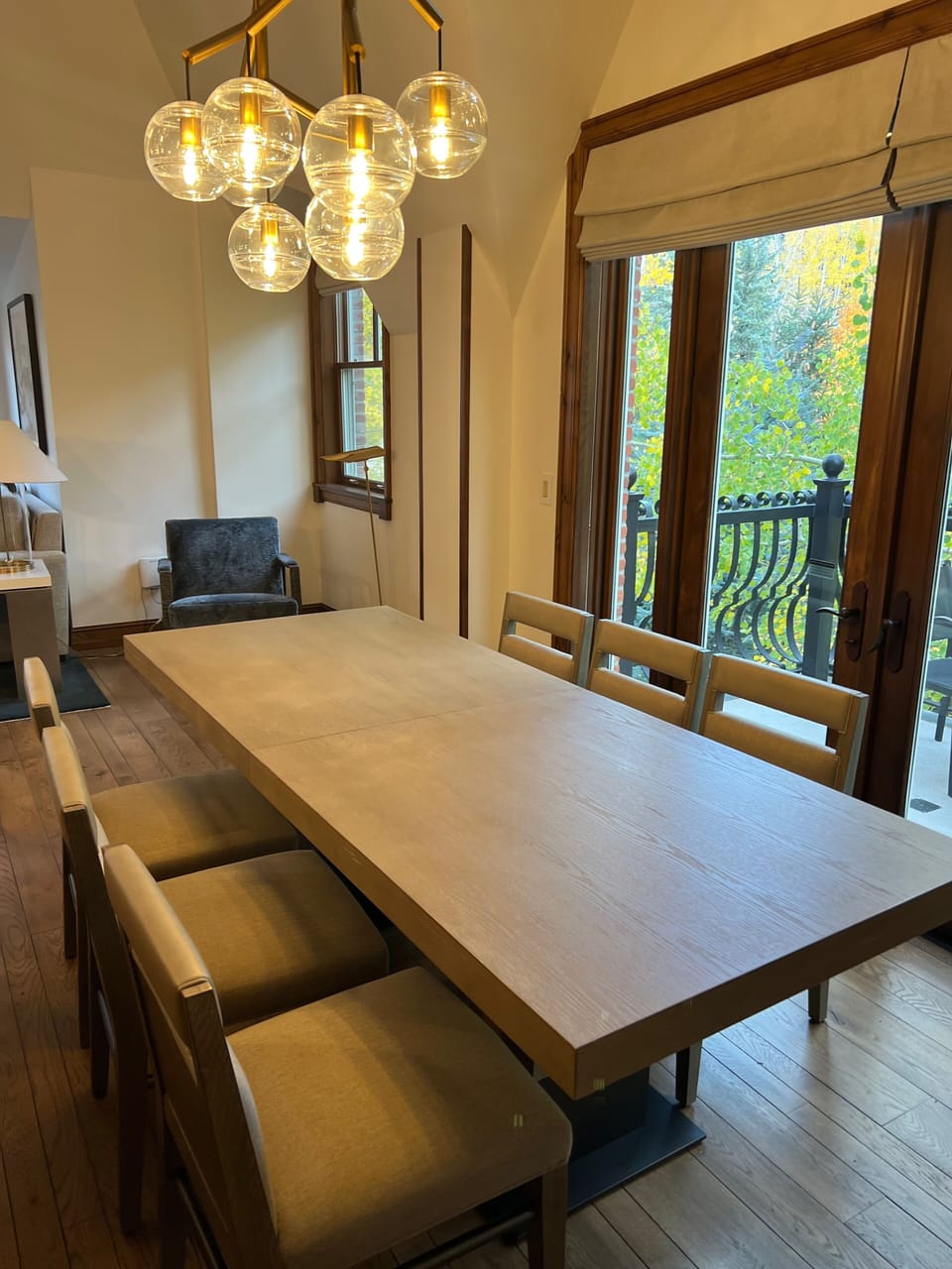 Dining room table, balcony facing fire pit and Aspen Mt