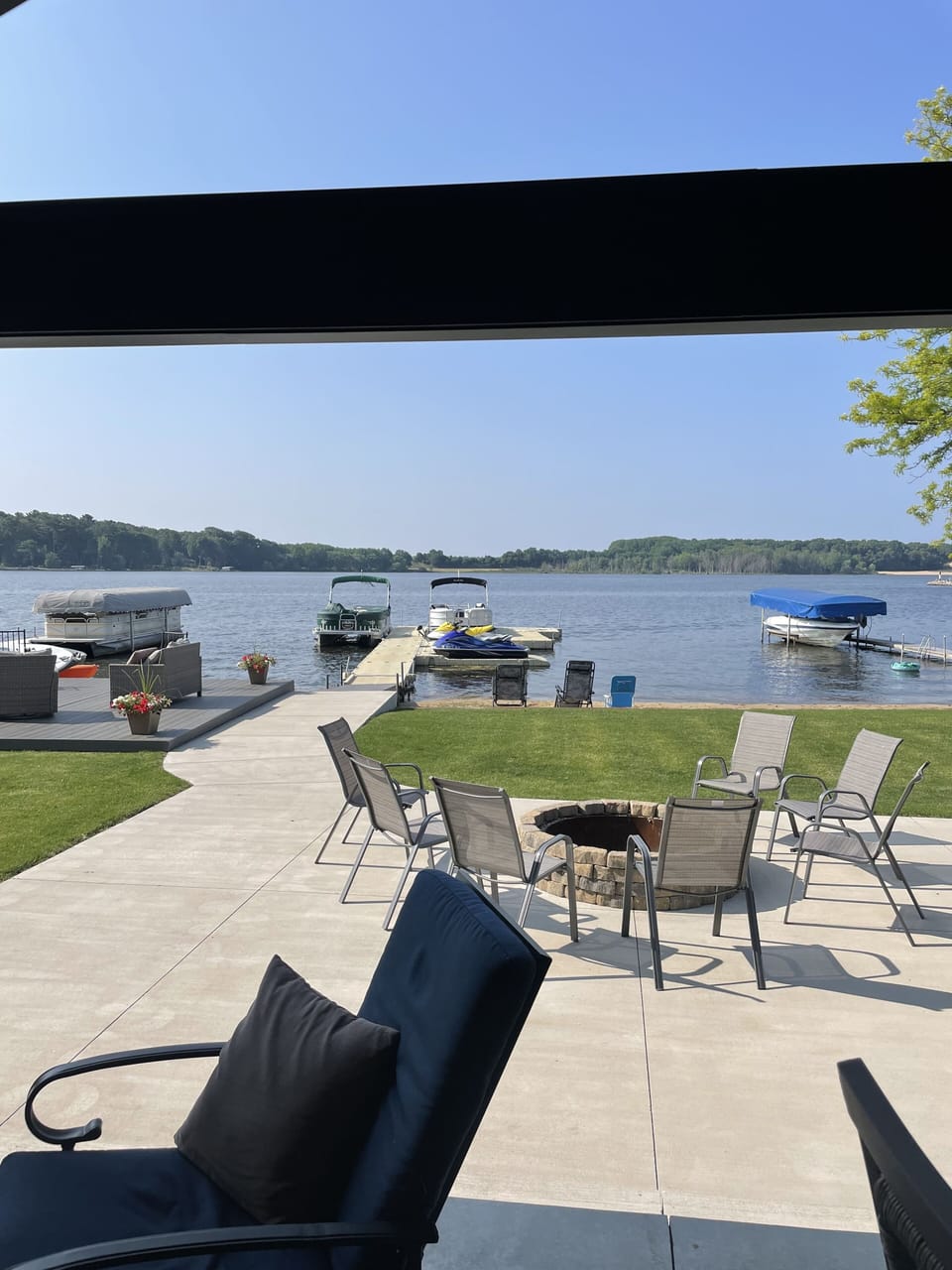 Looking at lake and dock from covered porch