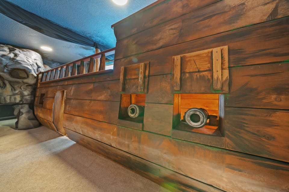 - Pirate ship playroom designed with cannons and deck  
- Creative kids space full of adventure and excitement  
- Imaginative setup makes every stay unforgettable fun