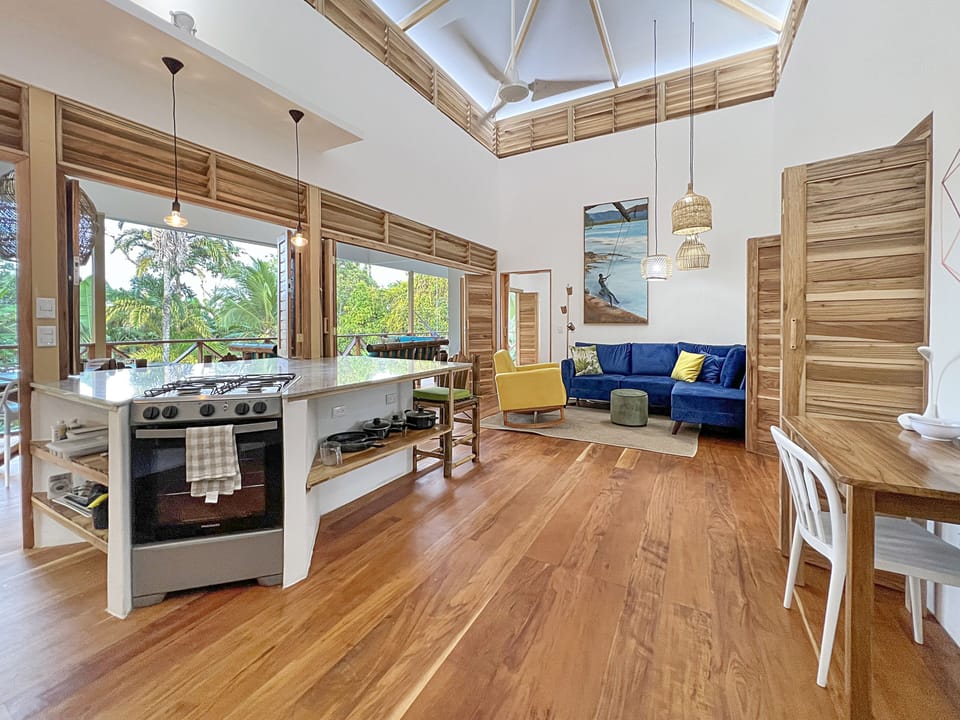 Open air kitchen allows chef to chat with guests while still enjoying the view.