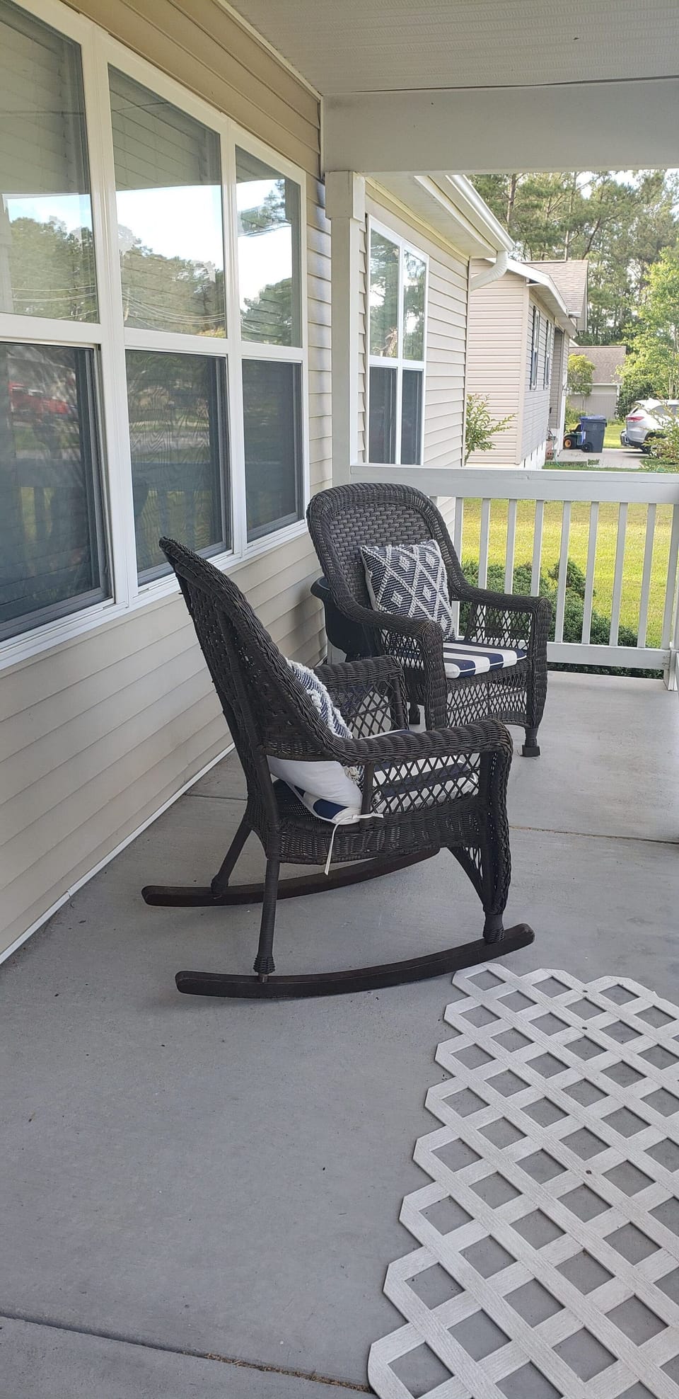Front Porch with Four Rocking Chairs
