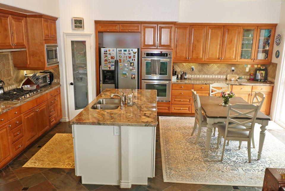 New Samsung cooktop, in corner is large walk-in pantry.