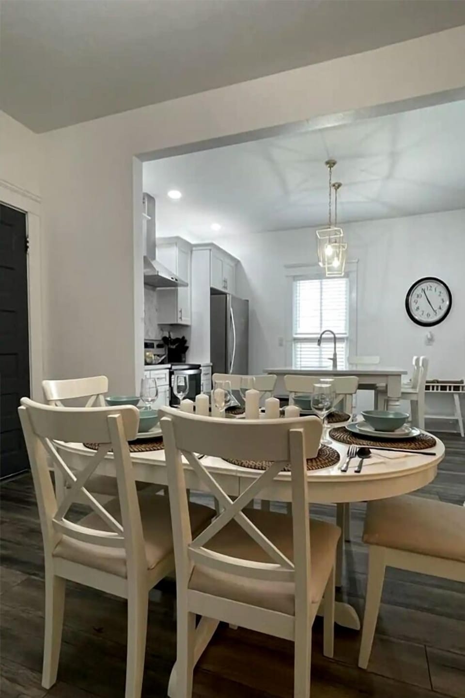 The space of the kitchen extends to the formal dinning and coffee & tea area