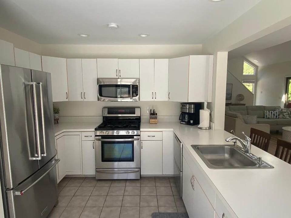 Kitchen with K Cup and drip coffee, indoor and outdoor plates & glasses