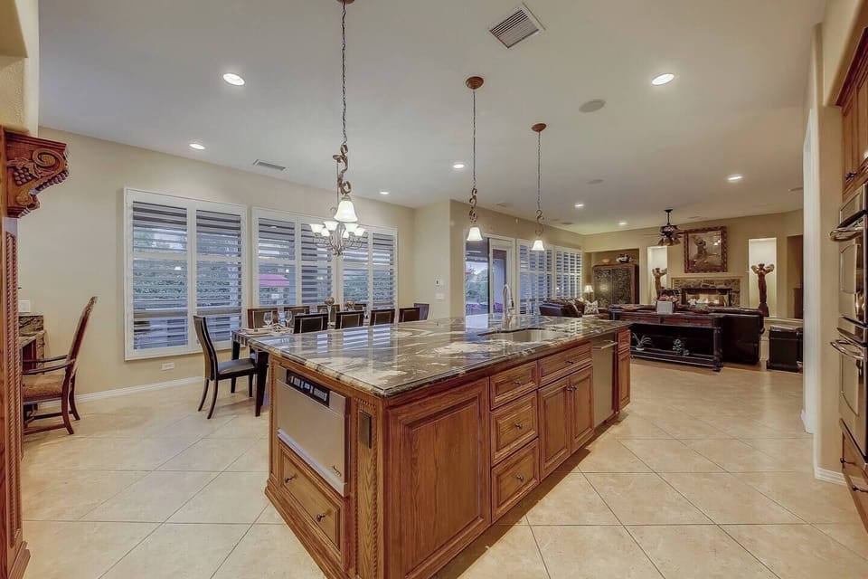fancy kitchen with Stainless applianes and 6 burner gas dacor stove for iron chef competitions!