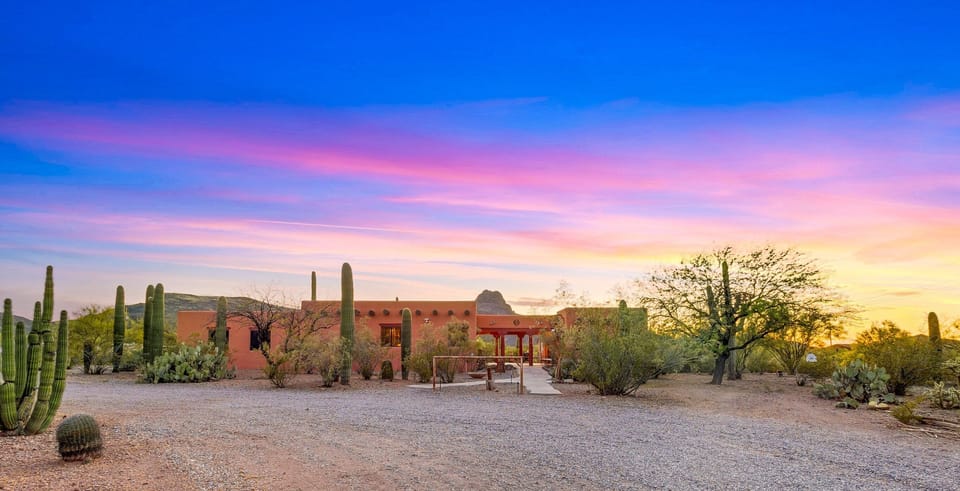 Tucked away on 5 acres, with views of the Tucson Mountains, just minutes from Saguaro National Park, with nearby hiking/ riding trails.