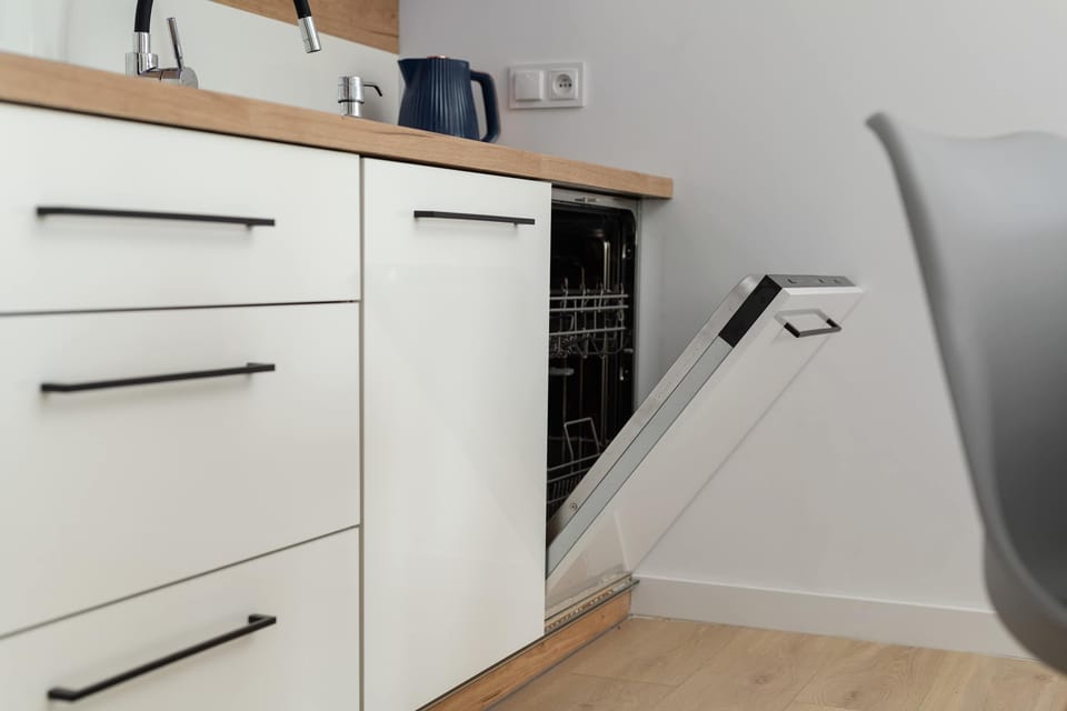 The fully equipped kitchenette includes everything you need for a home-cooked meal.