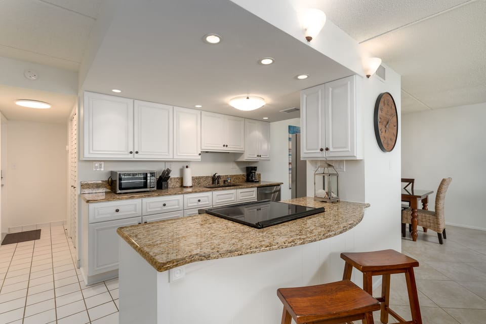 Cook in style in the updated kitchen, complete with sleek granite countertops