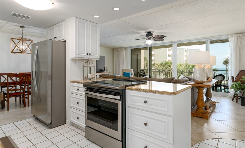 Cook meals with an ocean view in this fully equipped kitchen
