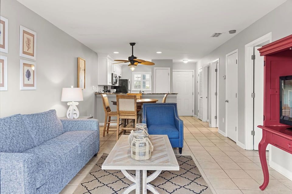 Living Area - The spacious living area offers comfortable furnishings including a sofa sleeper for additional, overnight guests.