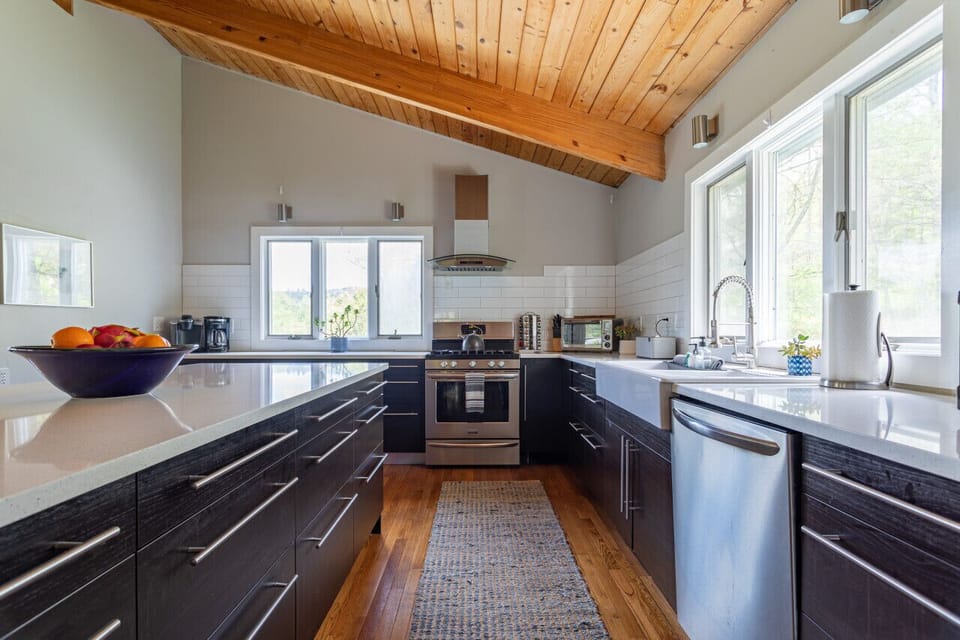 Chef`s kitchen with new stainless steel appliances