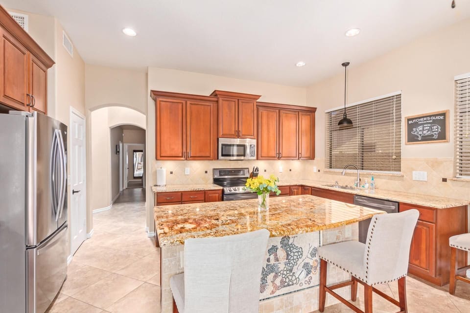 Large kitchen with granite counter tops