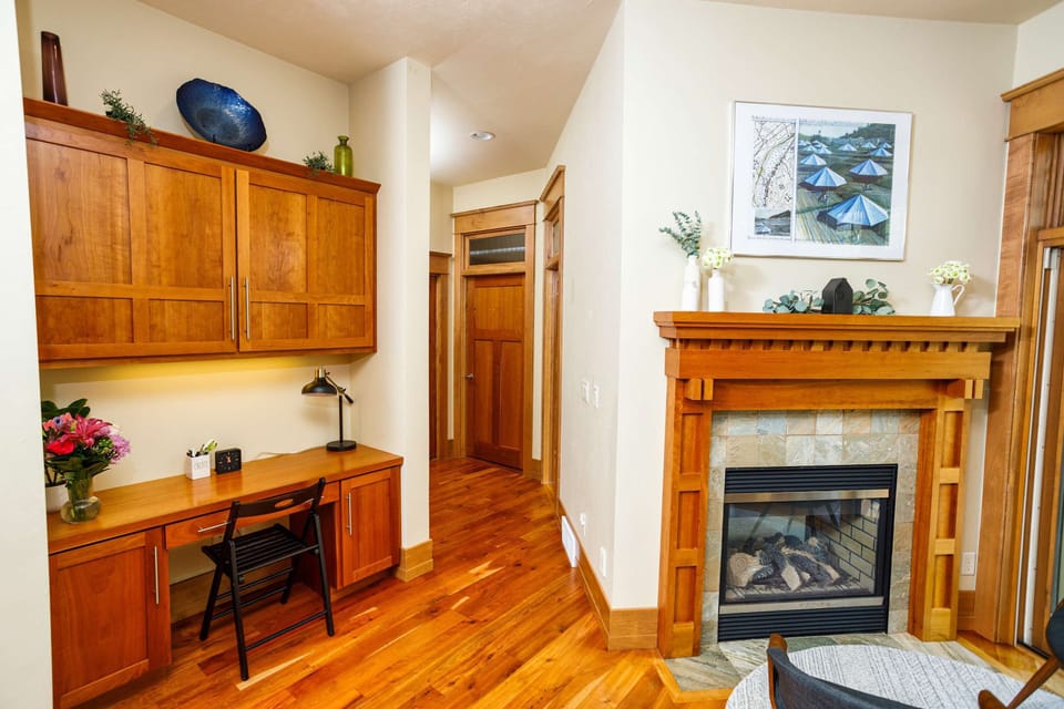 Dedicated work space next to the gas-burning fireplace