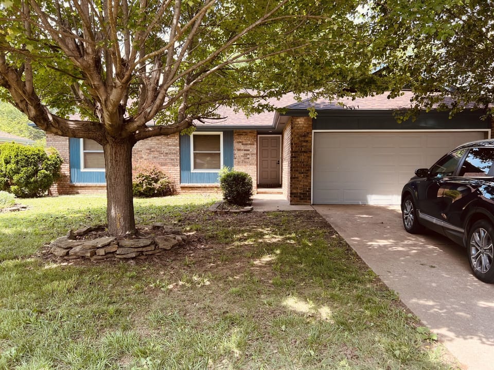 Beautiful quiet residential street with trees and sidewalks