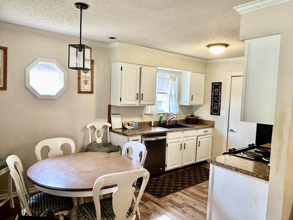 Updated, modern kitchen with dining area.