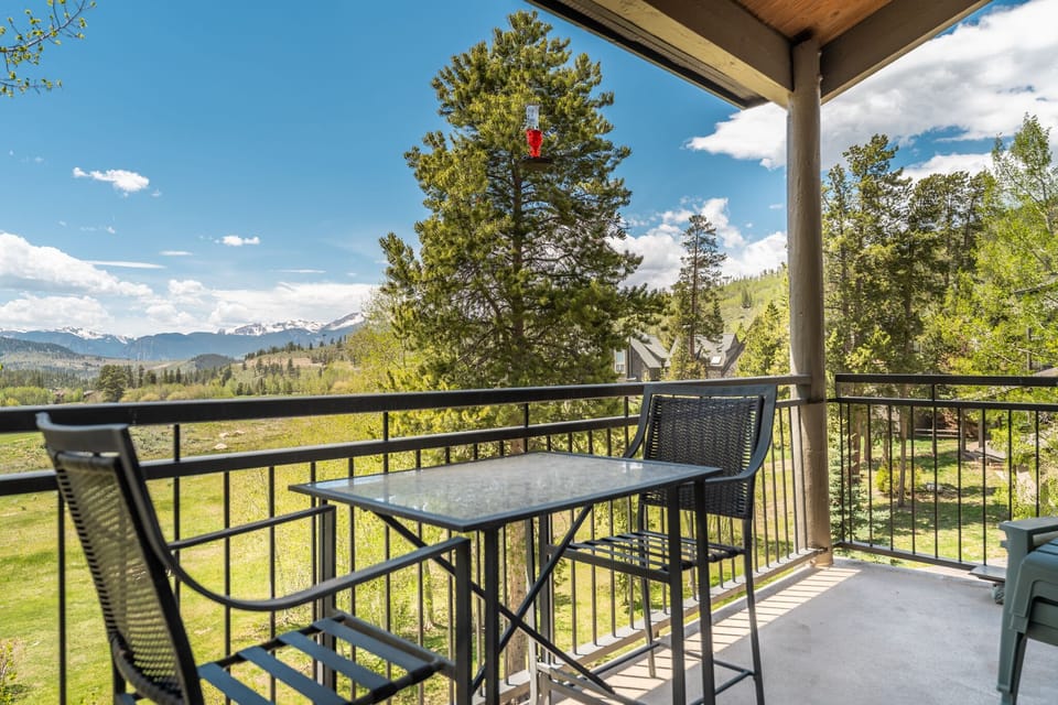 Private balcony with outdoor seating and incredible views.