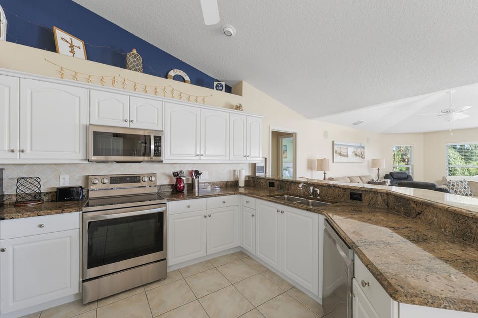 Fully Equipped Kitchen with Stainless Steel Appliances