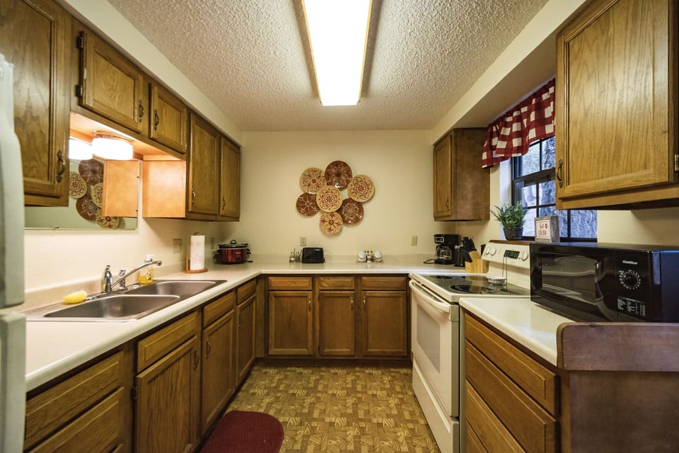 Features a galley style kitchen. 