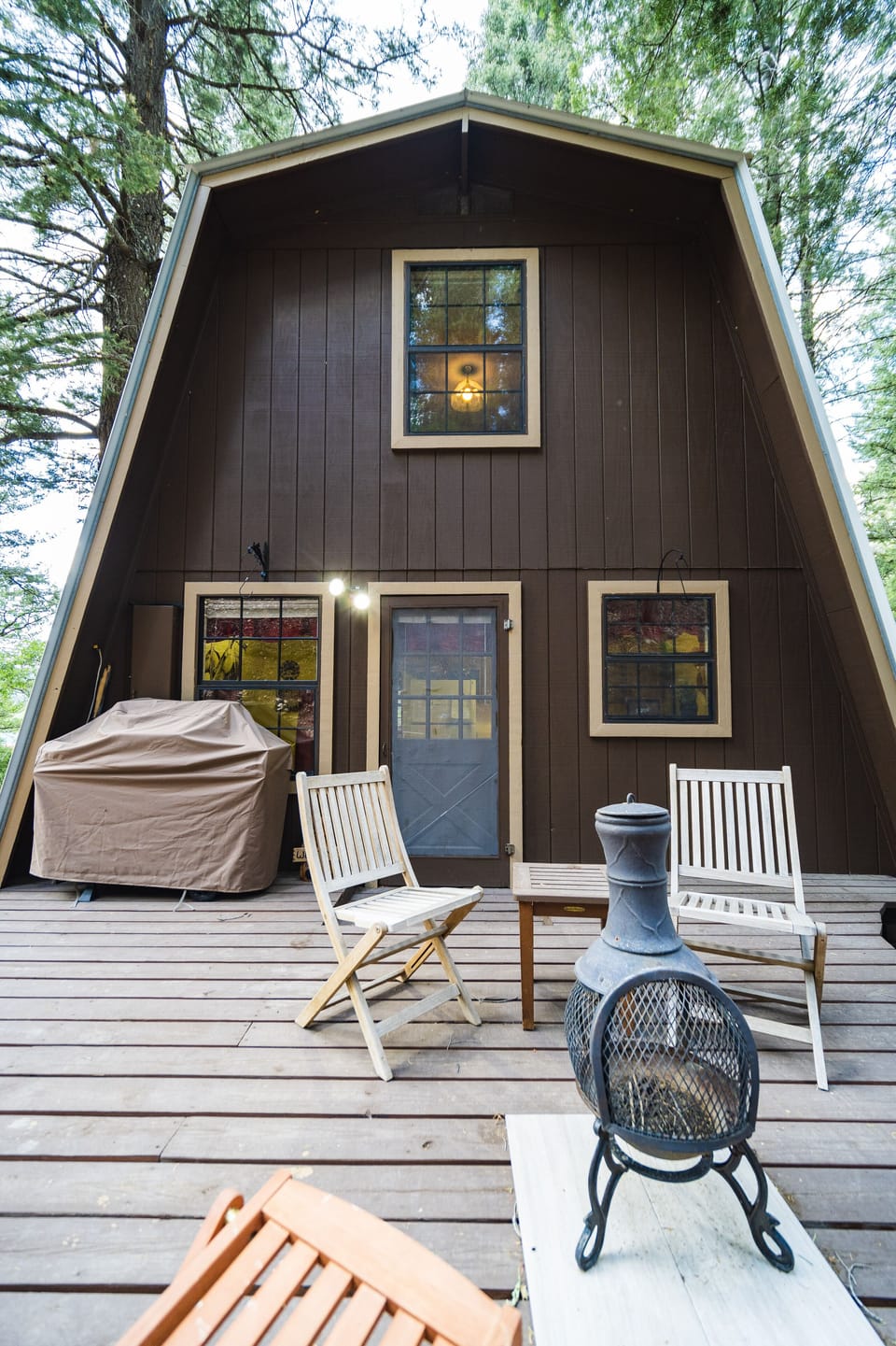 Deck off the back of the cabin with Propane grill, & picnic table. 