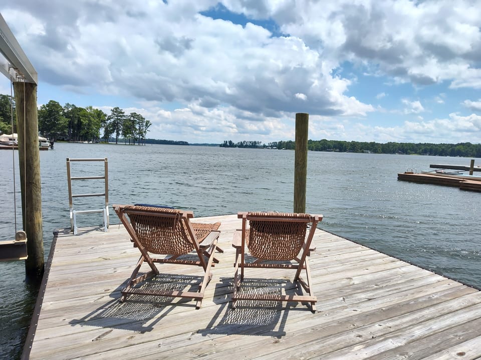 floating dock with Key West Hammock company chairs