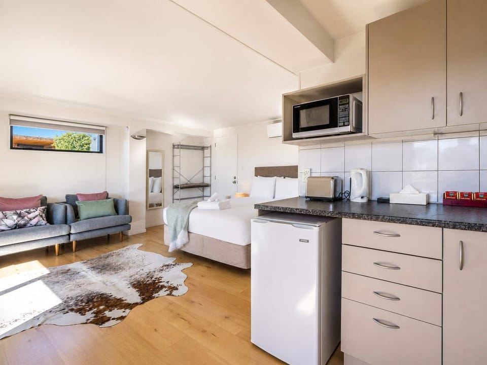 Kitchenette with microwave, kettle and toaster. Tea and plunger coffee provided