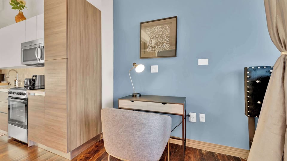 Wake up to stunning downtown views and a stylish workspace for your creative ideas