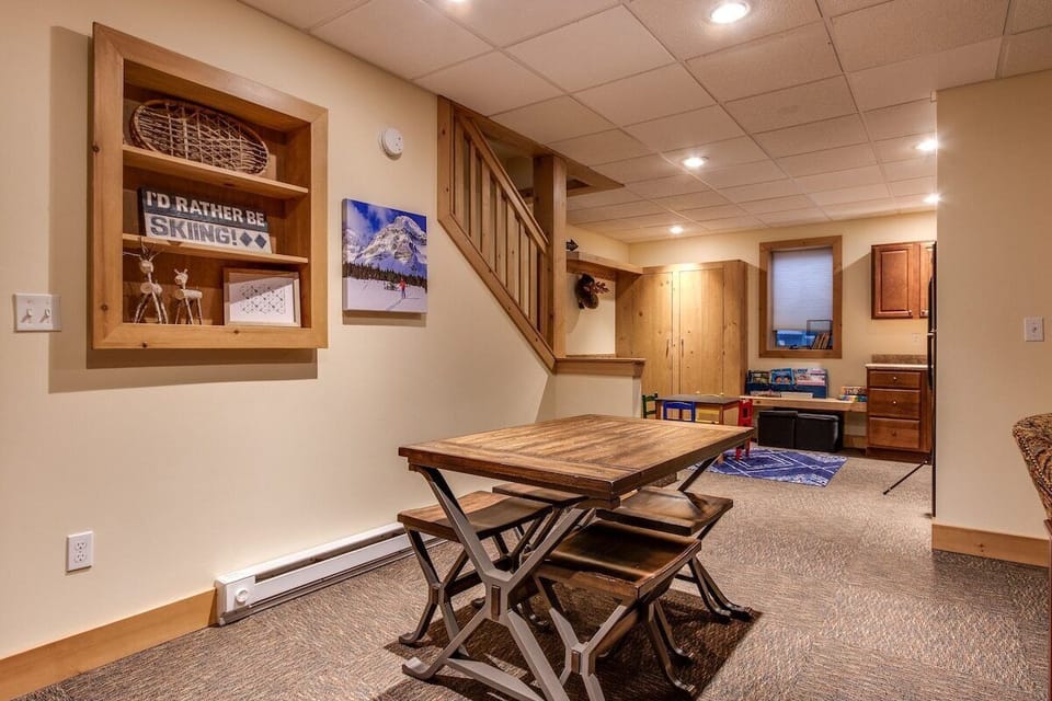Basement kitchenette  Keurig, full refrigerator/freezer and kids play zone