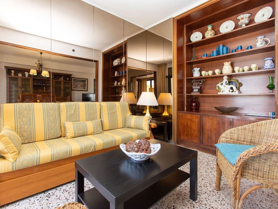 Table, Furniture, Property, Couch, Picture Frame, Wood, Interior Design, Living Room, Shelf, Floor
