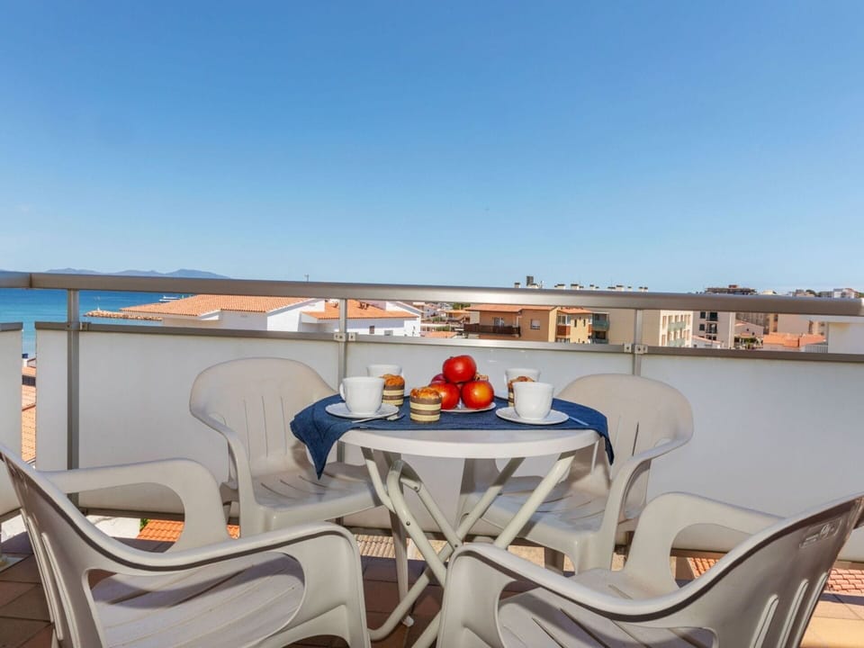 Sky, Table, Furniture, Property, Azure, Chair, Outdoor Table, Outdoor Furniture, Shade, Tableware