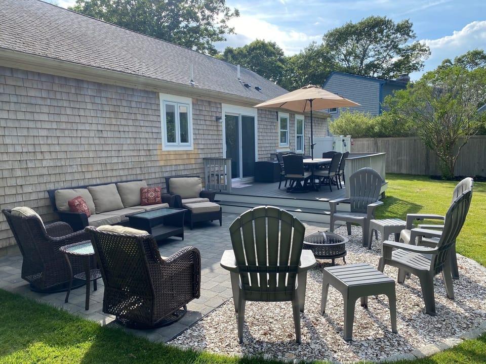 Outdoor living, featuring deck, patio, gas grill and fire pit