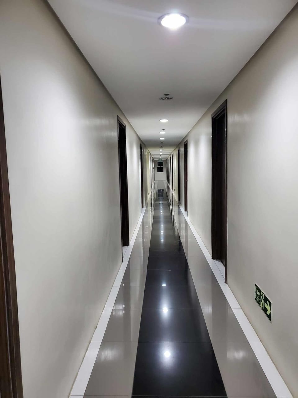 Hallway of unit equipped with cctv for guests safety.